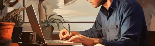 man at desk working using property management software on laptop